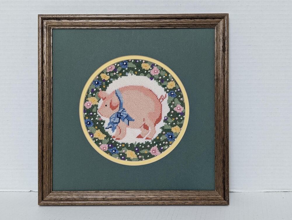 Vintage Counted Cross Stitch: Pink Piglet with Blue Bow in Wildflower Circle